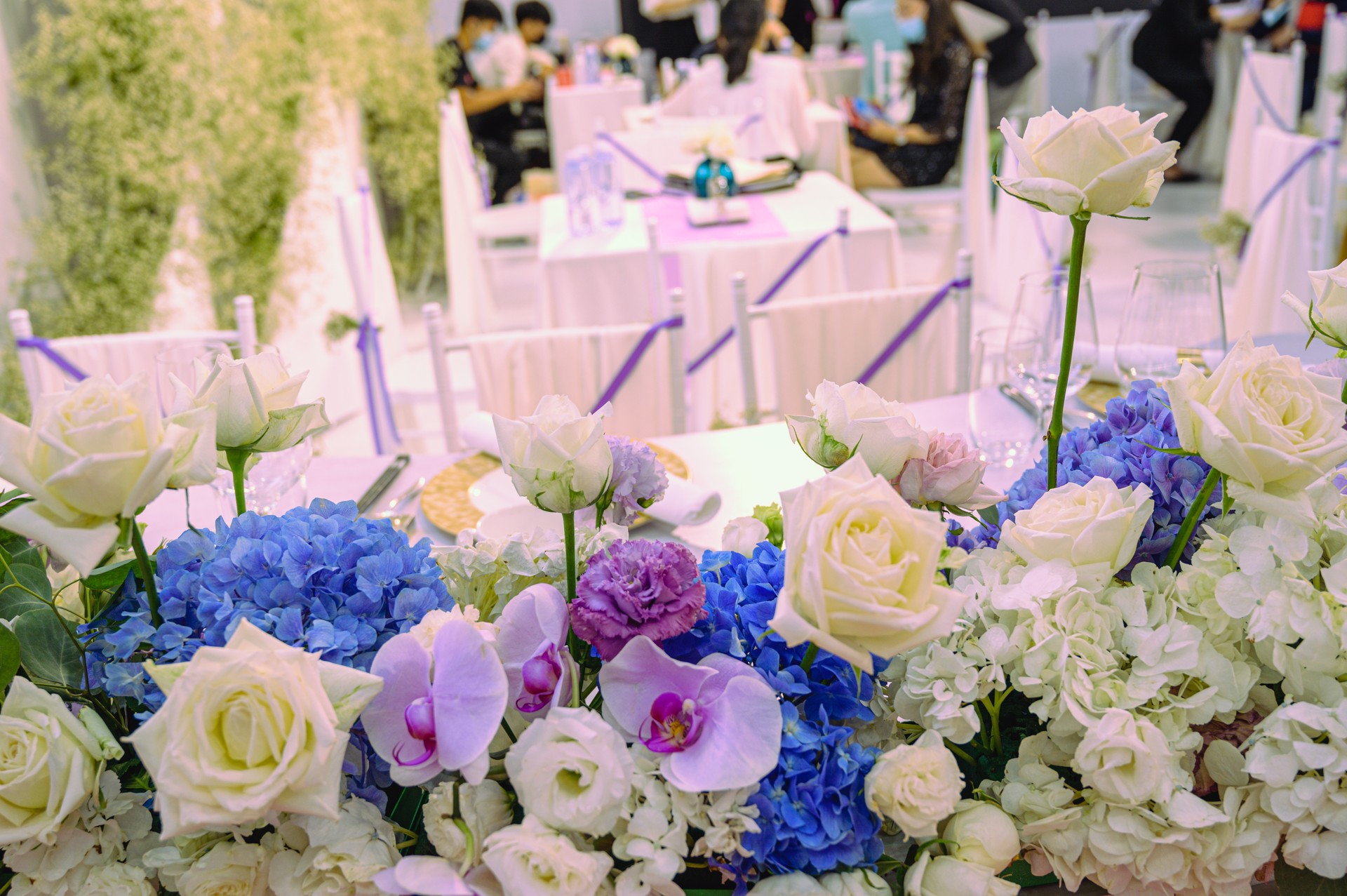 Decorating flower settings on a local wedding exhibition in Shenzhen, China (Horizontal)